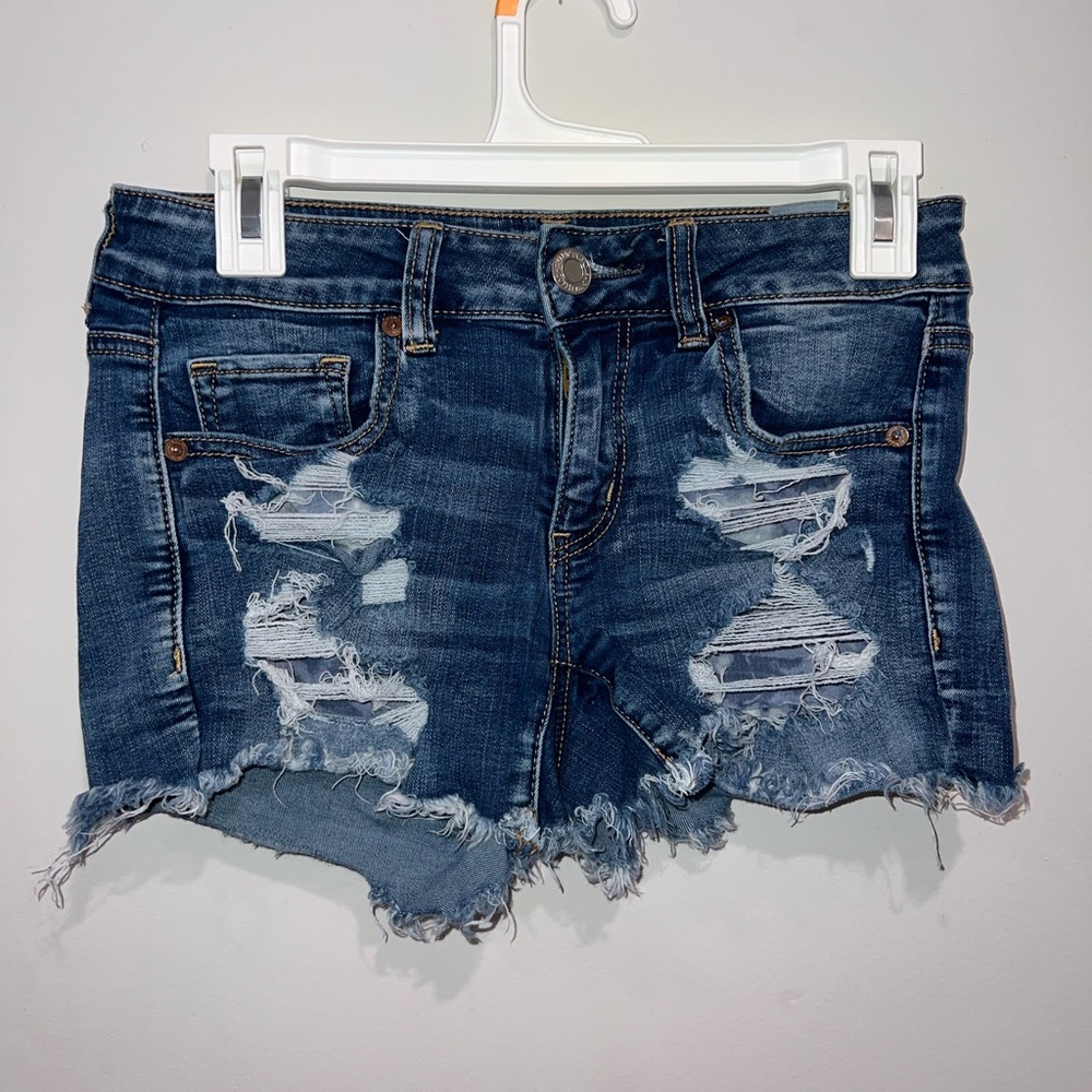 American Eagle Jean shorts. Size 4. Are tight and pretty short but comfortable.